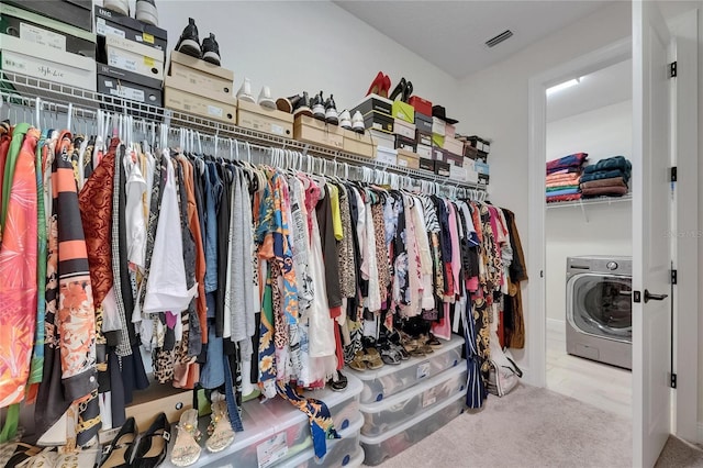 6252 Hidden Branch Dr, Apollo Beach, FL 33572 - spacious closet featuring visible vents, washer / dryer, and carpet floors