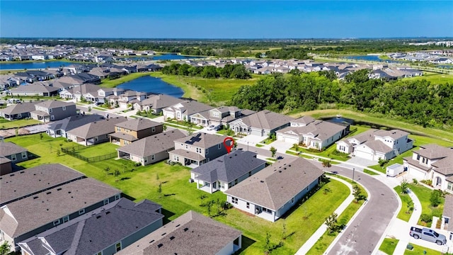 6252 Hidden Branch Dr, Apollo Beach, FL 33572 - bird's eye view with a water view and a residential view