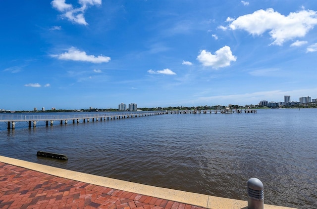 241 Riverside Dr Unit 1107, Daytona Beach, FL 32117 - dock area with a water view and a city view