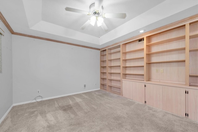 2231 Utopian Dr E Unit 117, Clearwater, FL 33763 - carpeted empty room with a raised ceiling, ceiling fan, baseboards, and recessed lighting