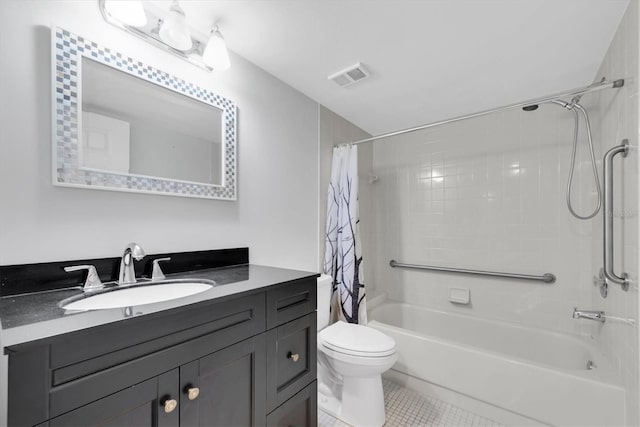 2231 Utopian Dr E Unit 117, Clearwater, FL 33763 - bathroom with shower / bathtub combination with curtain, tile patterned floors, vanity, and toilet
