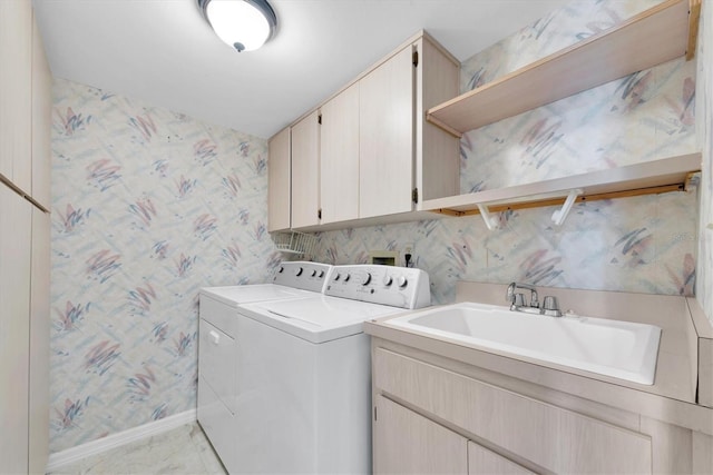 2231 Utopian Dr E Unit 117, Clearwater, FL 33763 - washroom with cabinet space, washer and clothes dryer, wallpapered walls, and baseboards