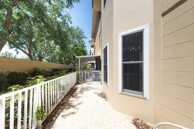 2231 Utopian Dr E Unit 117, Clearwater, FL 33763 - view of patio featuring a balcony