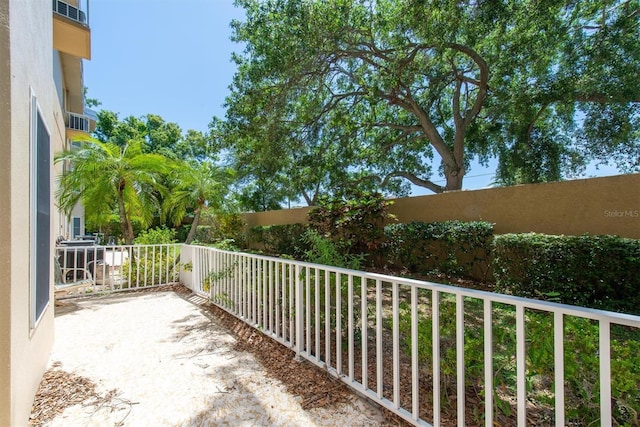 2231 Utopian Dr E Unit 117, Clearwater, FL 33763 - view of patio featuring a balcony