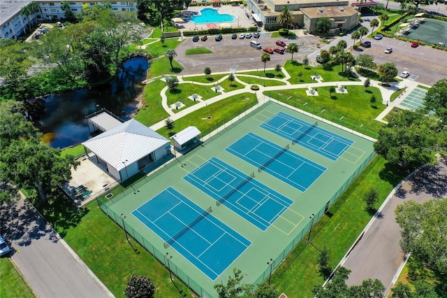 2231 Utopian Dr E Unit 117, Clearwater, FL 33763 - drone / aerial view of a pool and a large body of water