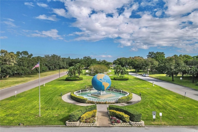 2231 Utopian Dr E Unit 117, Clearwater, FL 33763 - view of community with a yard and view of wooded area