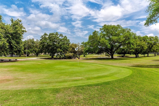 2231 Utopian Dr E Unit 117, Clearwater, FL 33763 - view of home's community with a yard, view of golf course, and view of scattered trees
