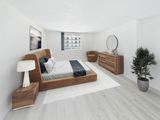 201 W Laurel St Unit 504B, Tampa, FL 33602 - bedroom with wood finished floors and baseboards