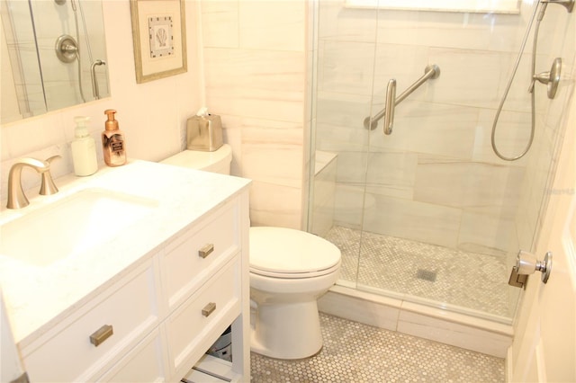 9950 47th Ave N Unit 311, Saint Petersburg, FL 33708 - full bathroom featuring tile patterned floors, a stall shower, toilet, and vanity
