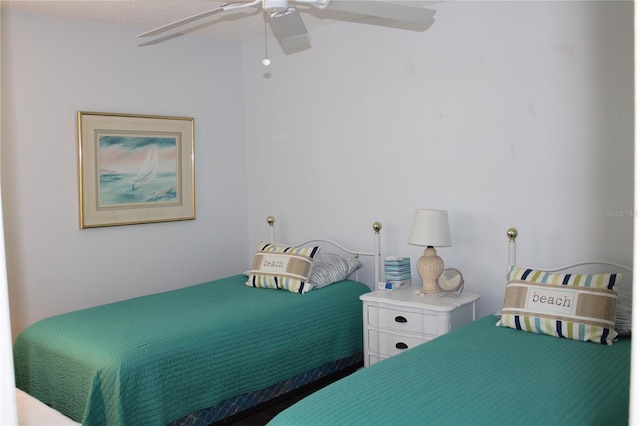 9950 47th Ave N Unit 311, Saint Petersburg, FL 33708 - bedroom featuring a ceiling fan