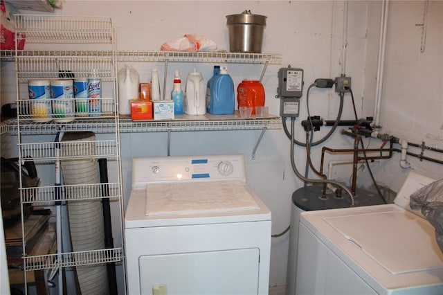 9950 47th Ave N Unit 311, Saint Petersburg, FL 33708 - clothes washing area featuring independent washer and dryer and laundry area