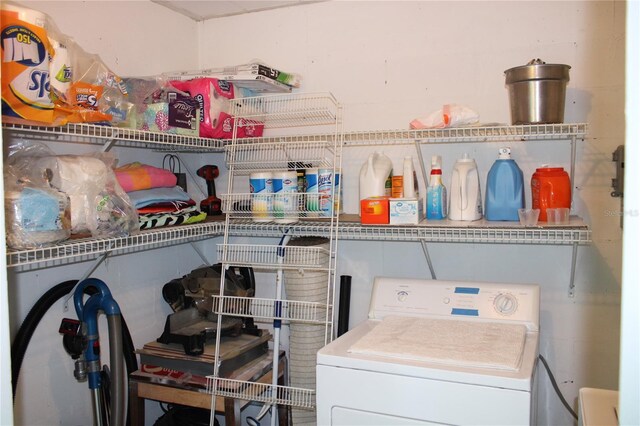 9950 47th Ave N Unit 311, Saint Petersburg, FL 33708 - washroom with laundry area and washer / clothes dryer