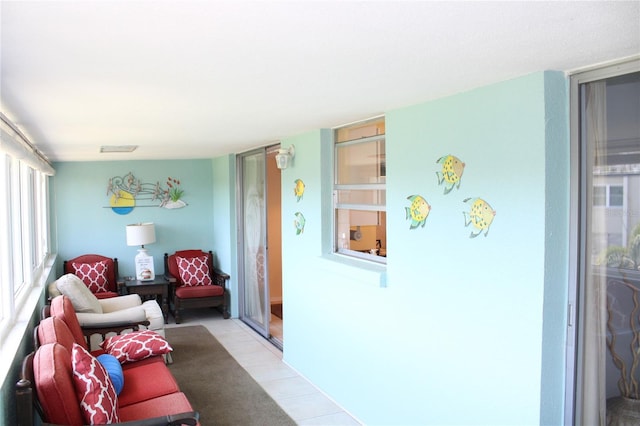 9950 47th Ave N Unit 311, Saint Petersburg, FL 33708 - living area with light tile patterned floors