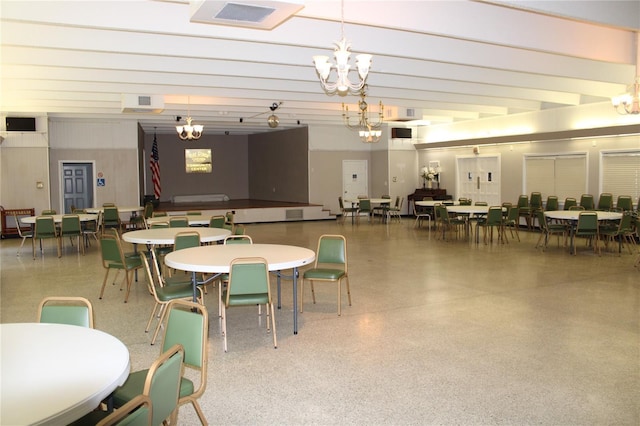 9950 47th Ave N Unit 311, Saint Petersburg, FL 33708 - dining area featuring a notable chandelier and speckled floor