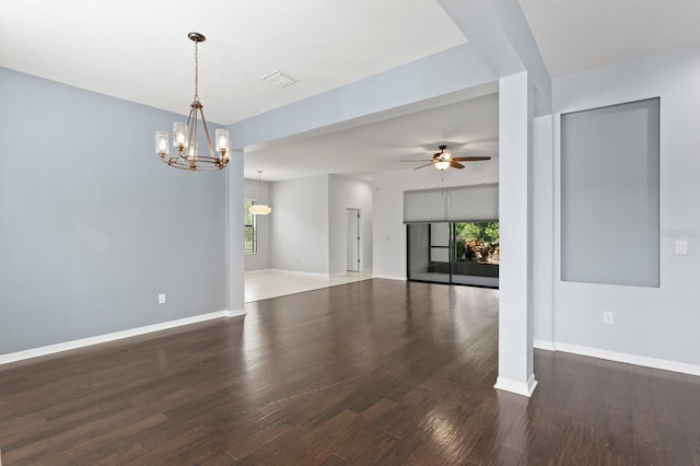 19407 Sweet Grass Way, Lutz, FL 33558 - empty room featuring baseboards, visible vents, wood finished floors, and ceiling fan with notable chandelier