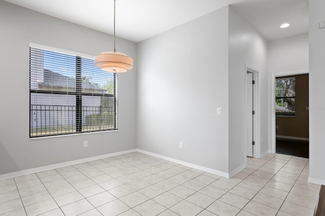19407 Sweet Grass Way, Lutz, FL 33558 - spare room featuring light tile patterned floors, recessed lighting, and baseboards