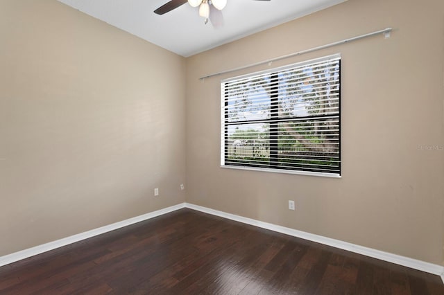 19407 Sweet Grass Way, Lutz, FL 33558 - empty room featuring baseboards, a ceiling fan, and dark wood-style floors
