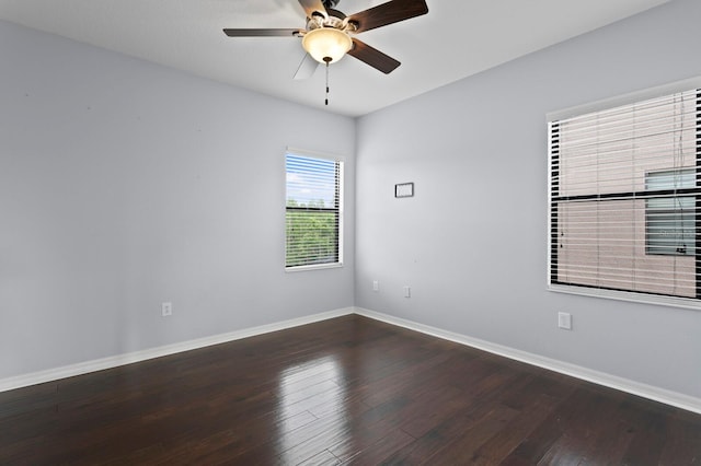 19407 Sweet Grass Way, Lutz, FL 33558 - empty room with ceiling fan, wood finished floors, and baseboards