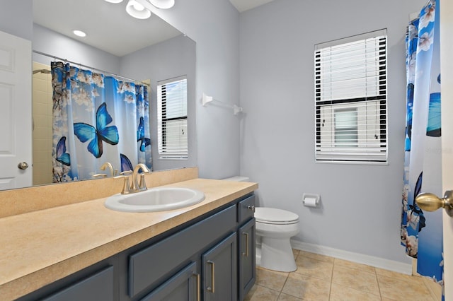 19407 Sweet Grass Way, Lutz, FL 33558 - bathroom with a shower with shower curtain, baseboards, toilet, vanity, and tile patterned flooring