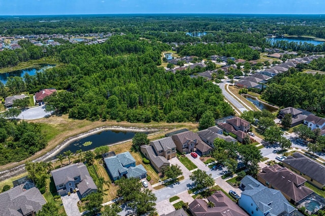 19407 Sweet Grass Way, Lutz, FL 33558 - aerial view with a water view, a residential view, and a forest view