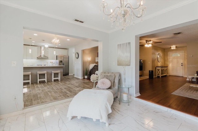 living area with baseboards, ornamental molding, marble finish floor, and visible vents