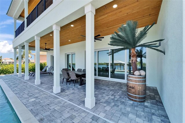 935 Chipaway Dr, Apollo Beach, FL 33572 - view of patio featuring a ceiling fan and outdoor dining area