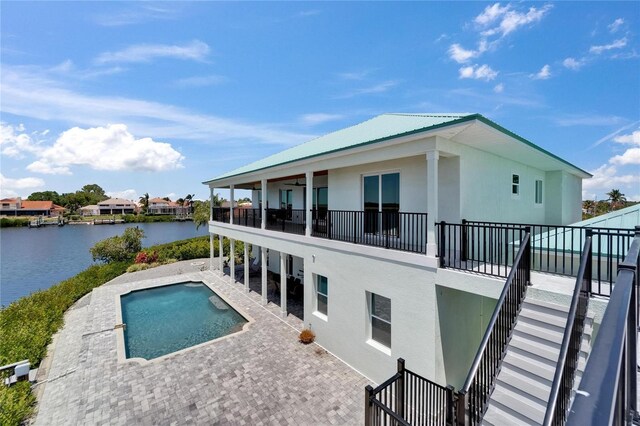 935 Chipaway Dr, Apollo Beach, FL 33572 - swimming pool with a water view and a patio