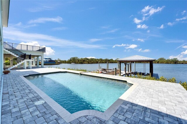 935 Chipaway Dr, Apollo Beach, FL 33572 - swimming pool featuring stairway, a water view, a patio, and a gazebo