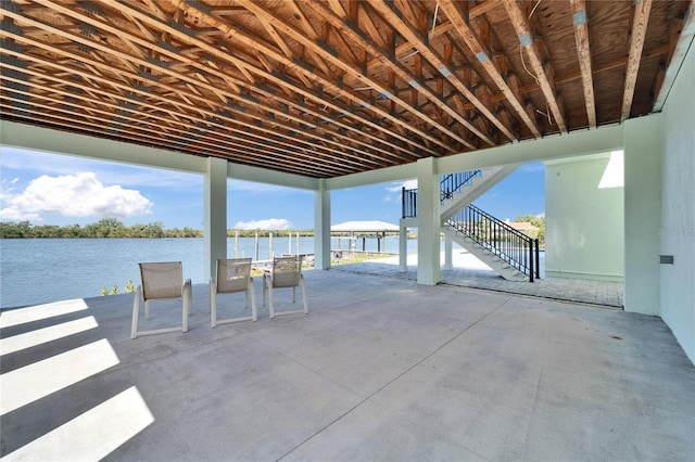 935 Chipaway Dr, Apollo Beach, FL 33572 - view of patio with stairs and a water view