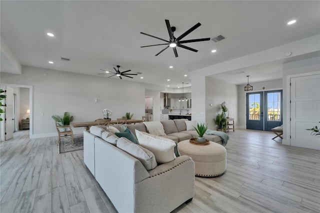 935 Chipaway Dr, Apollo Beach, FL 33572 - living area featuring light wood-style floors, ceiling fan, recessed lighting, and baseboards