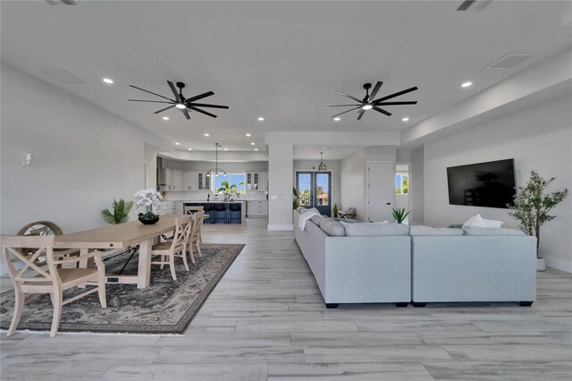 935 Chipaway Dr, Apollo Beach, FL 33572 - living room featuring recessed lighting, ceiling fan, light wood-type flooring, and baseboards