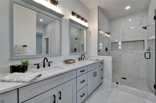 935 Chipaway Dr, Apollo Beach, FL 33572 - bathroom with a marble finish shower, marble look tile flooring, double vanity, and recessed lighting