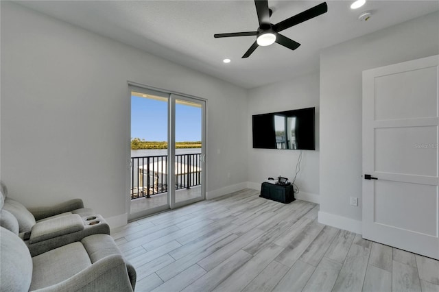 935 Chipaway Dr, Apollo Beach, FL 33572 - living area featuring ceiling fan, recessed lighting, baseboards, and light wood-style floors