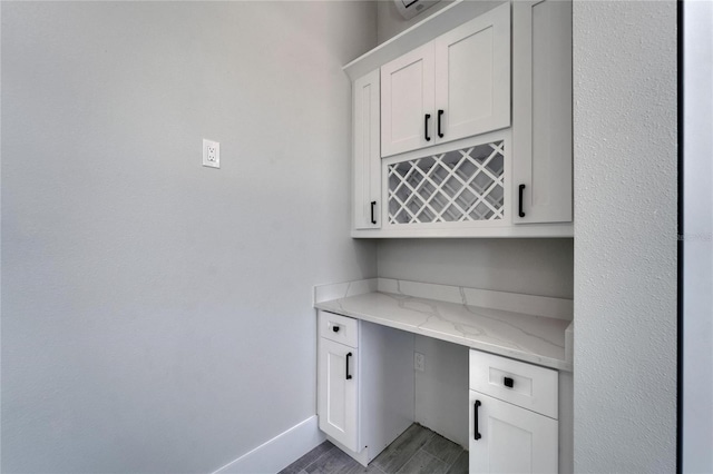 935 Chipaway Dr, Apollo Beach, FL 33572 - unfurnished office featuring a bar and baseboards