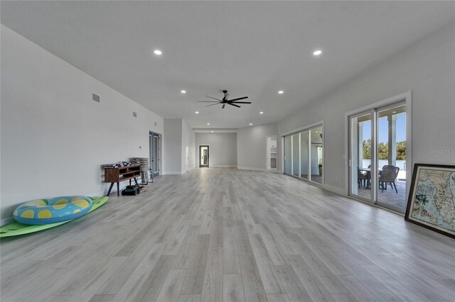 935 Chipaway Dr, Apollo Beach, FL 33572 - unfurnished living room featuring recessed lighting, light wood-type flooring, a ceiling fan, and baseboards
