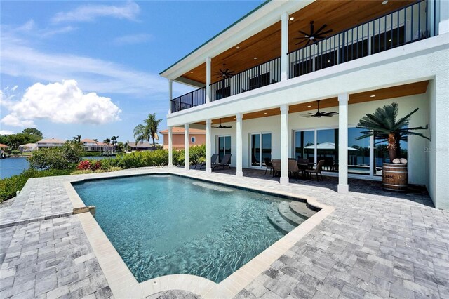 935 Chipaway Dr, Apollo Beach, FL 33572 - swimming pool featuring ceiling fan, a patio area, and outdoor dining area