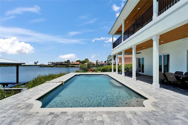 935 Chipaway Dr, Apollo Beach, FL 33572 - swimming pool featuring a water view and a patio