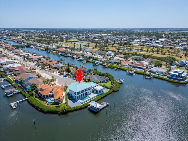 935 Chipaway Dr, Apollo Beach, FL 33572 - aerial perspective of suburban area with a large body of water