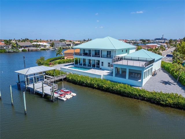 935 Chipaway Dr, Apollo Beach, FL 33572 - dock area featuring a balcony, boat lift, and a water view