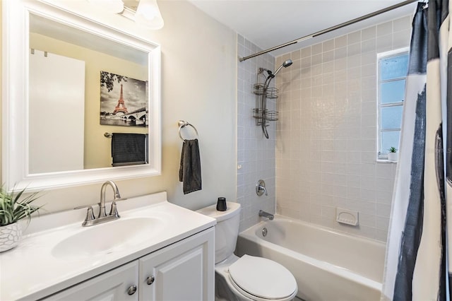 full bath with toilet, shower / bathtub combination with curtain, and vanity