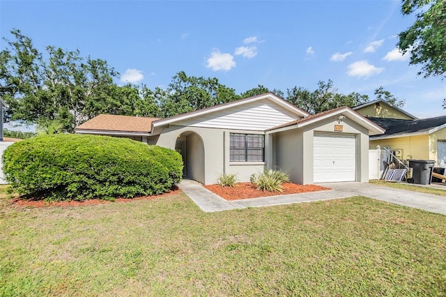 single story home featuring an attached garage, stucco siding, a front yard, and concrete driveway