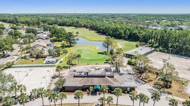 bird's eye view featuring a water view and golf course view