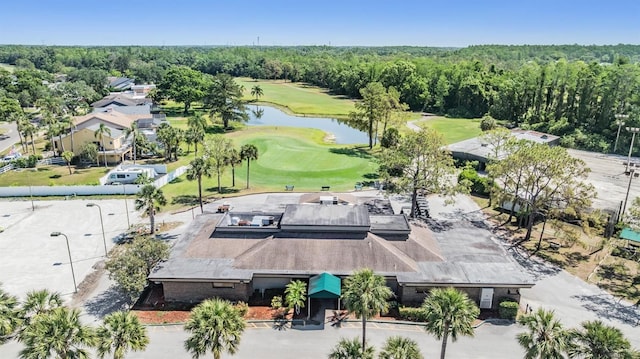 bird's eye view featuring view of golf course and a water view