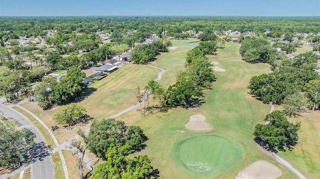 birds eye view of property featuring golf course view and a residential view
