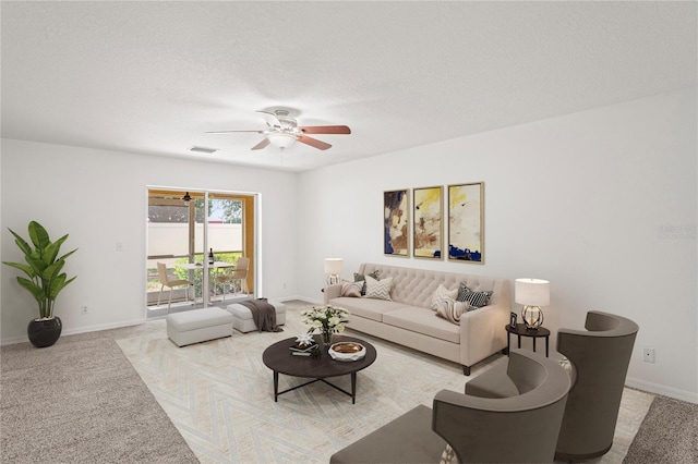living area with visible vents, baseboards, ceiling fan, a textured ceiling, and carpet