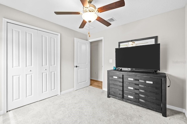 10333 Scarlet Skimmer Dr, Riverview, FL 33578 - bedroom with carpet, a closet, and ceiling fan