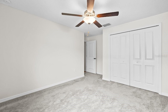 10333 Scarlet Skimmer Dr, Riverview, FL 33578 - unfurnished bedroom featuring carpet floors, a closet, and ceiling fan