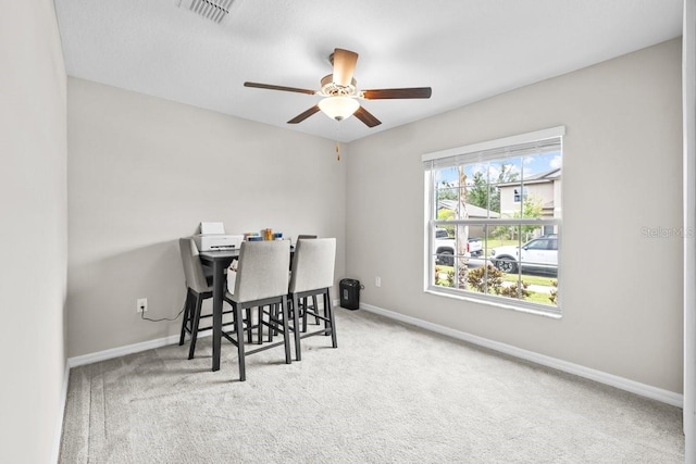 10333 Scarlet Skimmer Dr, Riverview, FL 33578 - dining room with carpet floors and a ceiling fan