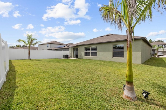 10333 Scarlet Skimmer Dr, Riverview, FL 33578 - back of property with stucco siding and a shingled roof
