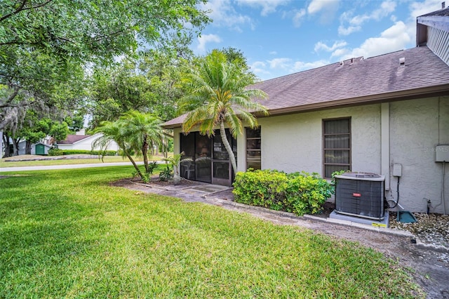 2506 Laurelwood Dr Unit 4C, Clearwater, FL 33763 - exterior space featuring a sunroom and central AC unit